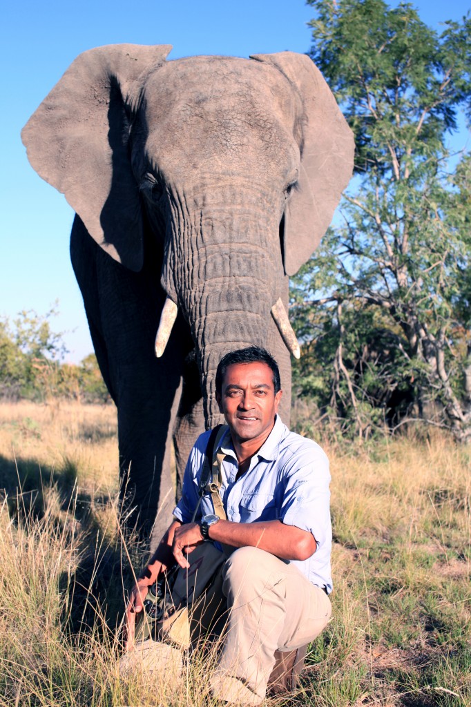 Conservation scientist M. Sanjayan on the African plains.