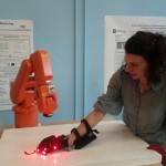 Trading places with Abbie the robot arm at Massachusetts Institute of Technology.
