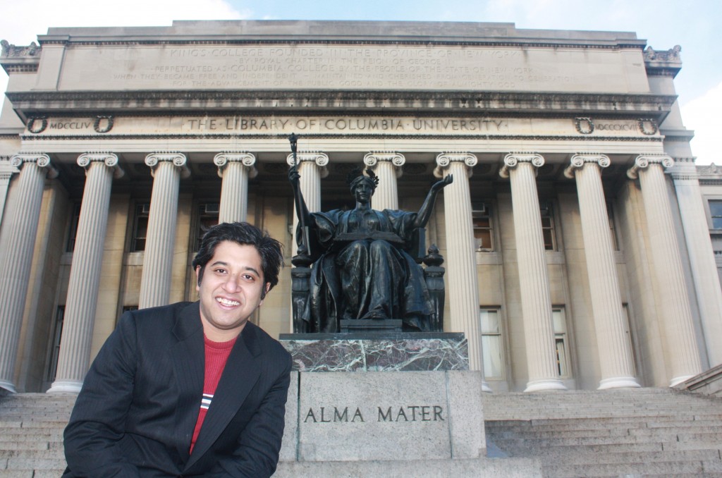 Arnab De in front of the famous Alma Mater statue at Columbia University.
