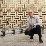 Etienne Rivet, the first author of the paper, in front of the prototype in our acoustic anechoic chamber at EPFL